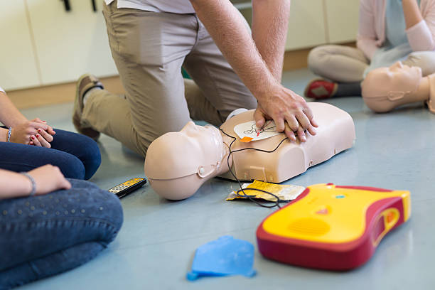 First aid cardiopulmonary resuscitation course using automated external defibrillator device, AED.